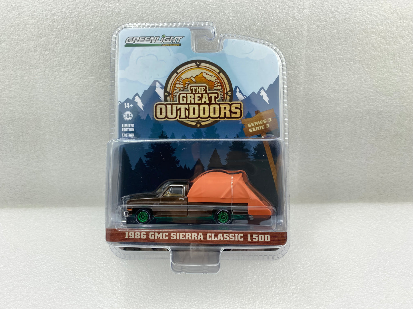 GreenLight Green Machine 1:64 The Great Outdoors Series 3 - 1986 GMC Sierra Classic 1500 - Dark Brown Metallic with Modern Truck Bed Tent 38050-D