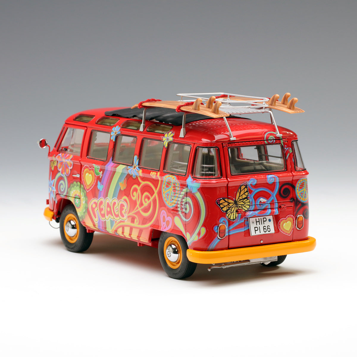 Schuco 1:18 Volkswagen T1 Samba "Hippie" with roof tracks and surfboards 450028300