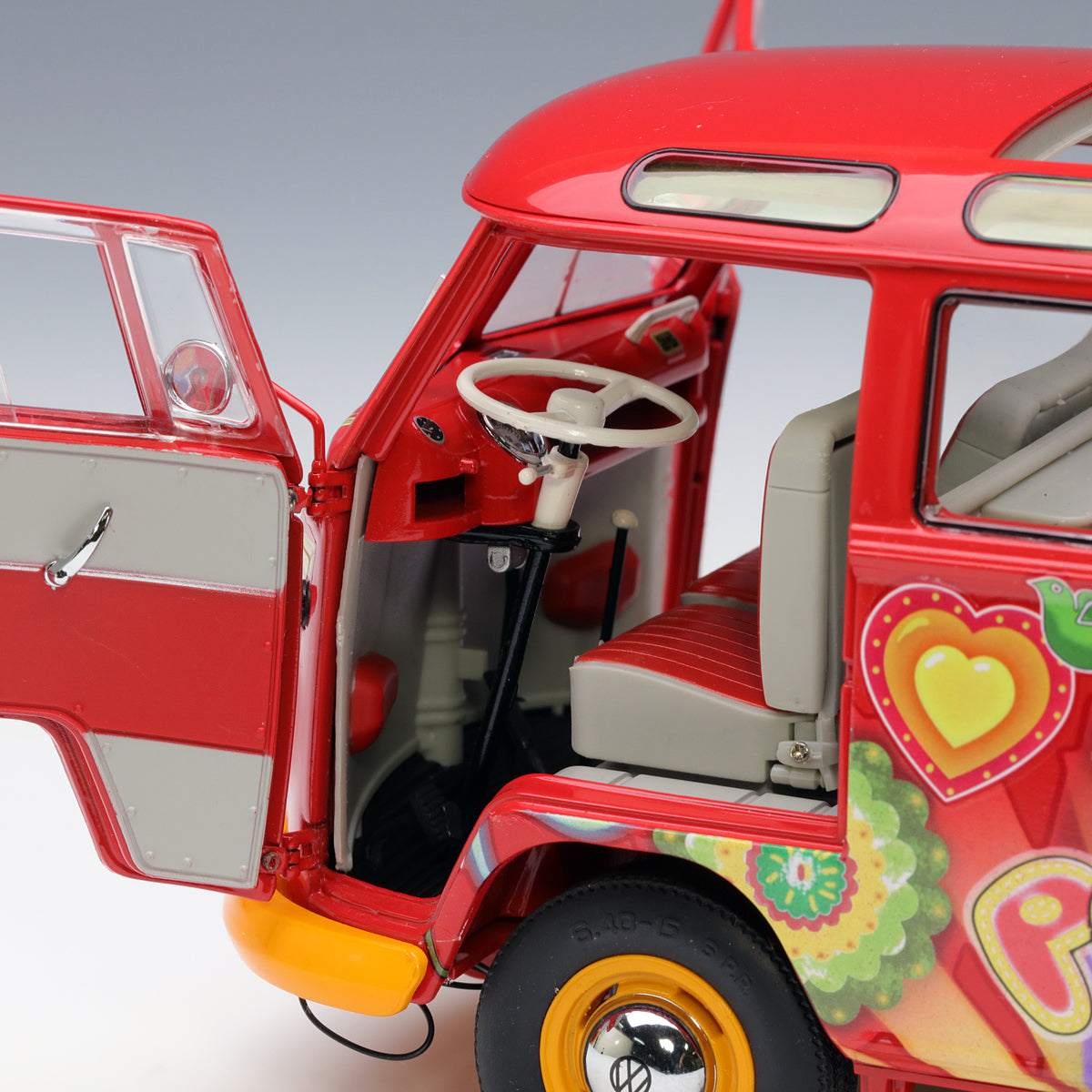 Schuco 1:18 Volkswagen T1 Samba "Hippie" with roof tracks and surfboards 450028300
