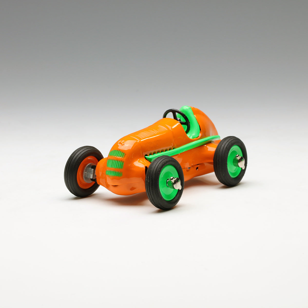 Schuco POP Art Edition I Studio 1 Diecast Clockwork Racing car Orange 450111400
