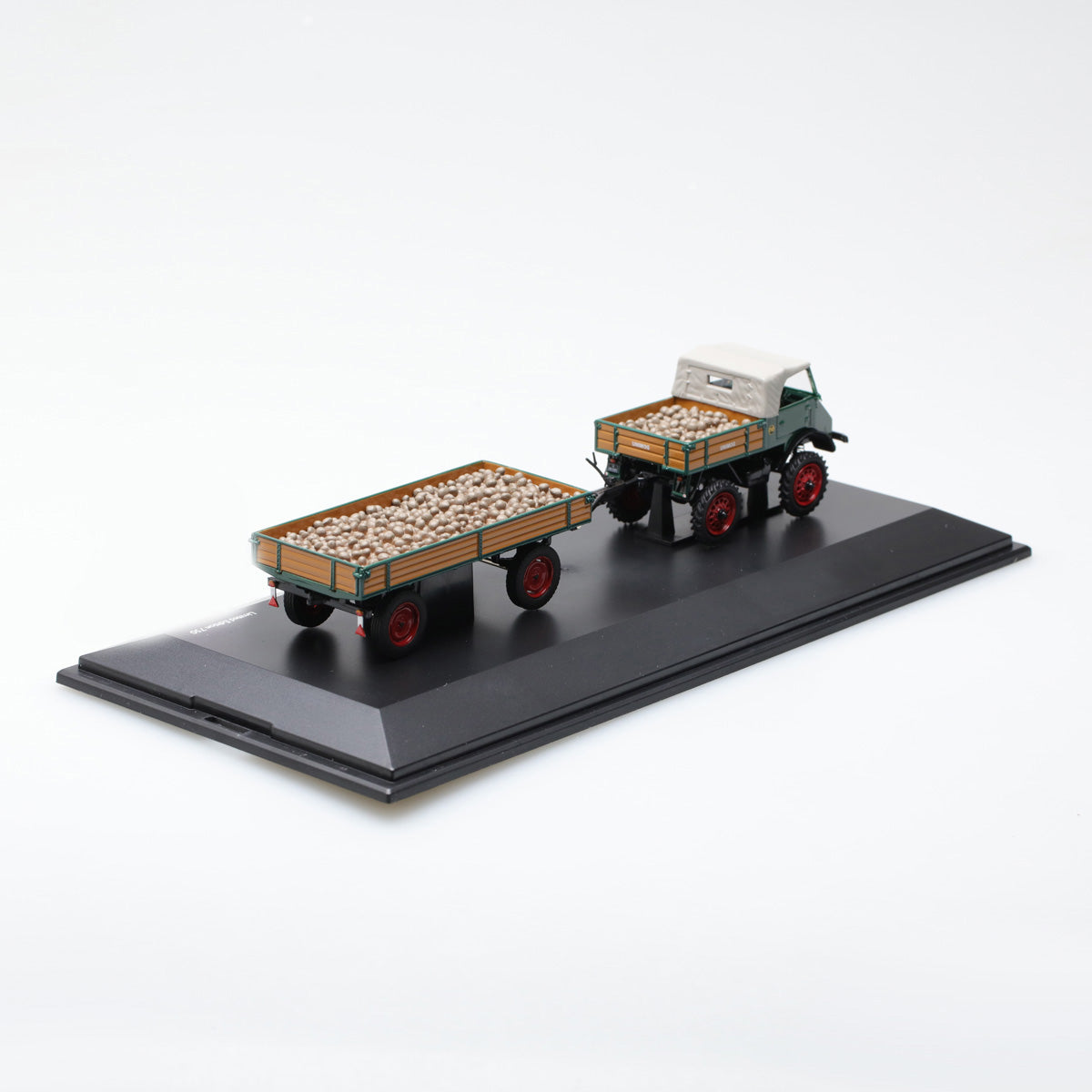 Schuco 1:43 Mercedes Benz Unimog U 401 with trailer and potatoes 450313000