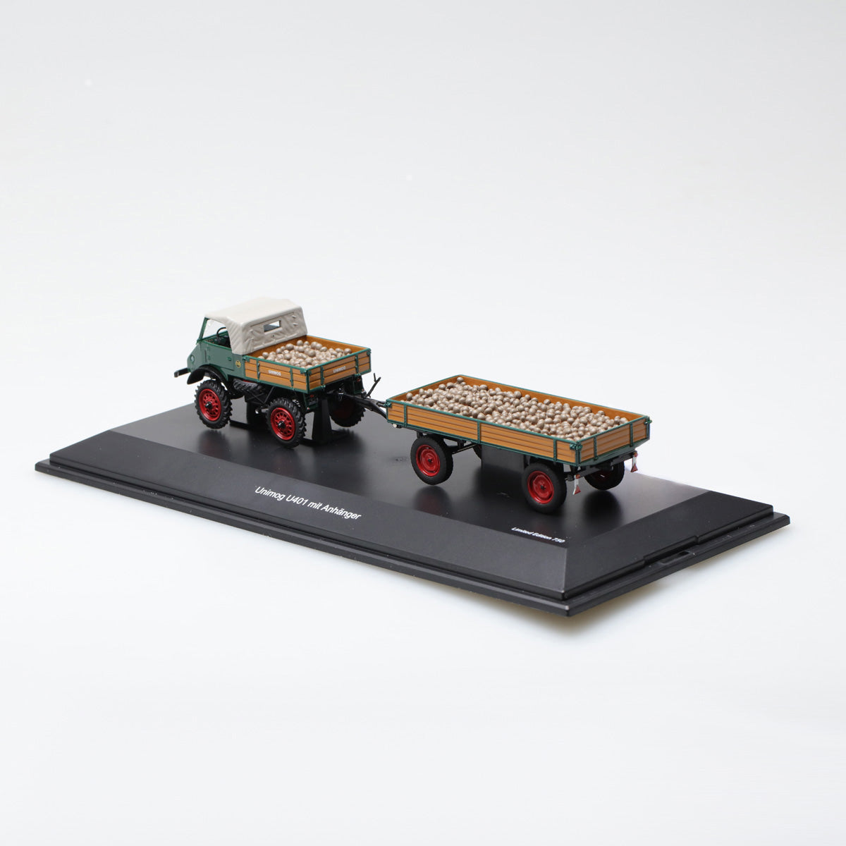 Schuco 1:43 Mercedes Benz Unimog U 401 with trailer and potatoes 450313000