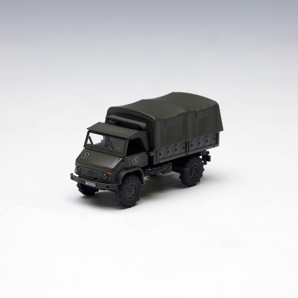 Schuco 1:87 Unimog S 404 pick up tarpaulin Bundeswehr 452625000