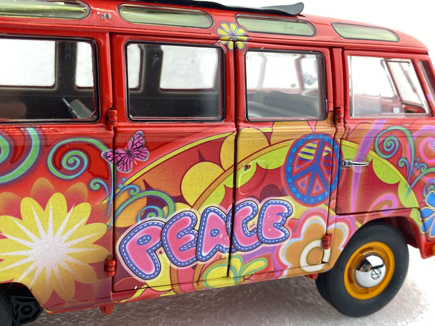 Schuco 1:18 Volkswagen T1 Samba "Hippie" with roof tracks and surfboards 450028300 (Clearance Final Sale)