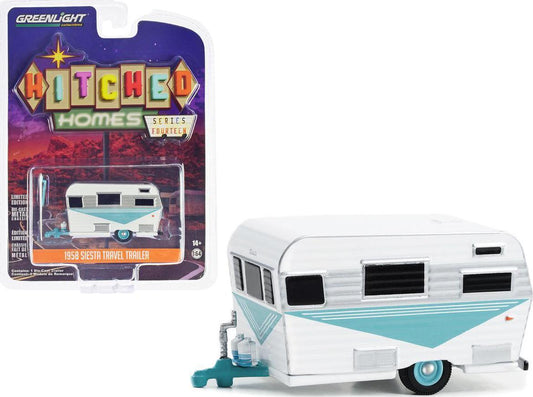GreenLight 1:64 Hitched Homes Series 14 - 1958 Siesta Travel Trailer - Teal, White and Polished Silver 34140-B