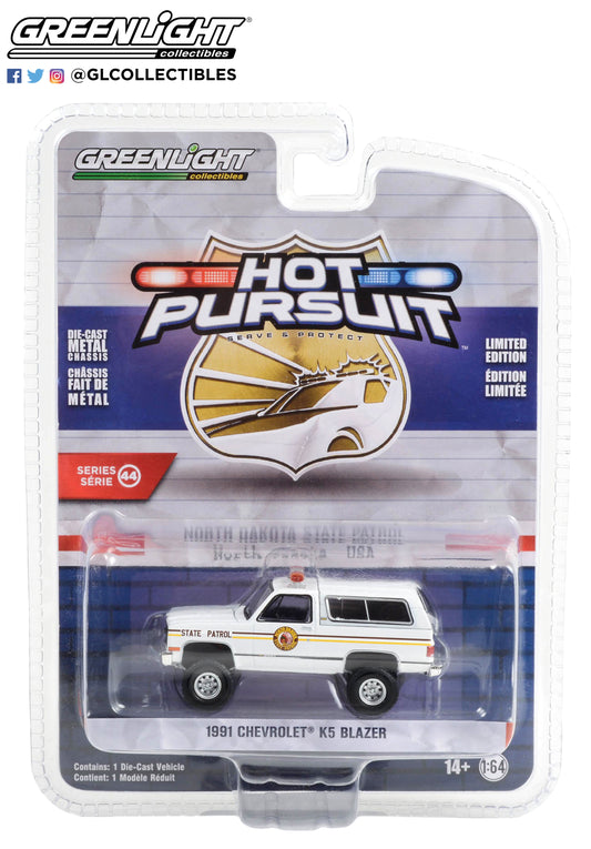 GreenLight 1:64 Hot Pursuit Series 44 - 1991 Chevrolet K5 Blazer - North Dakota State Patrol 43020-C