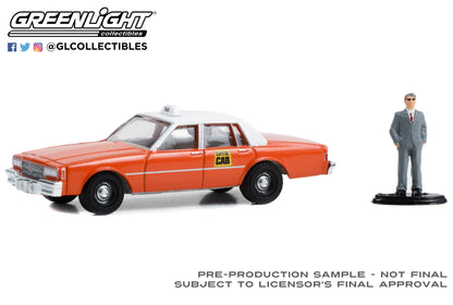 GreenLight 1:64 The Hobby Shop Series 15 - 1981 Chevrolet Impala Capitol Cab Taxi with Man in Suit 97150-B