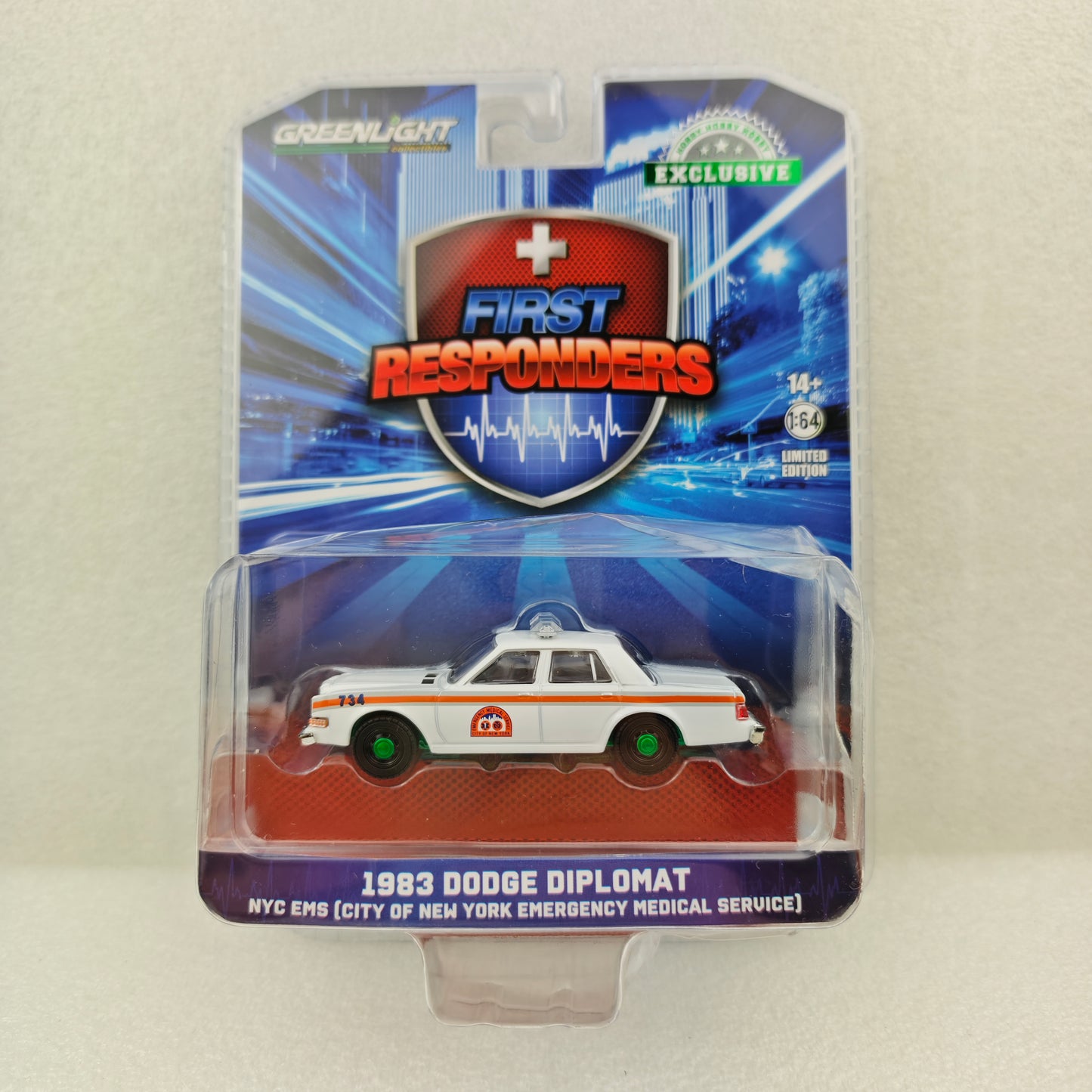 GreenLight Green Machine 1:64 First Responders - 1983 Dodge Diplomat - NYC EMS (City of New York Emergency Medical Service) (Hobby Exclusive) 30444