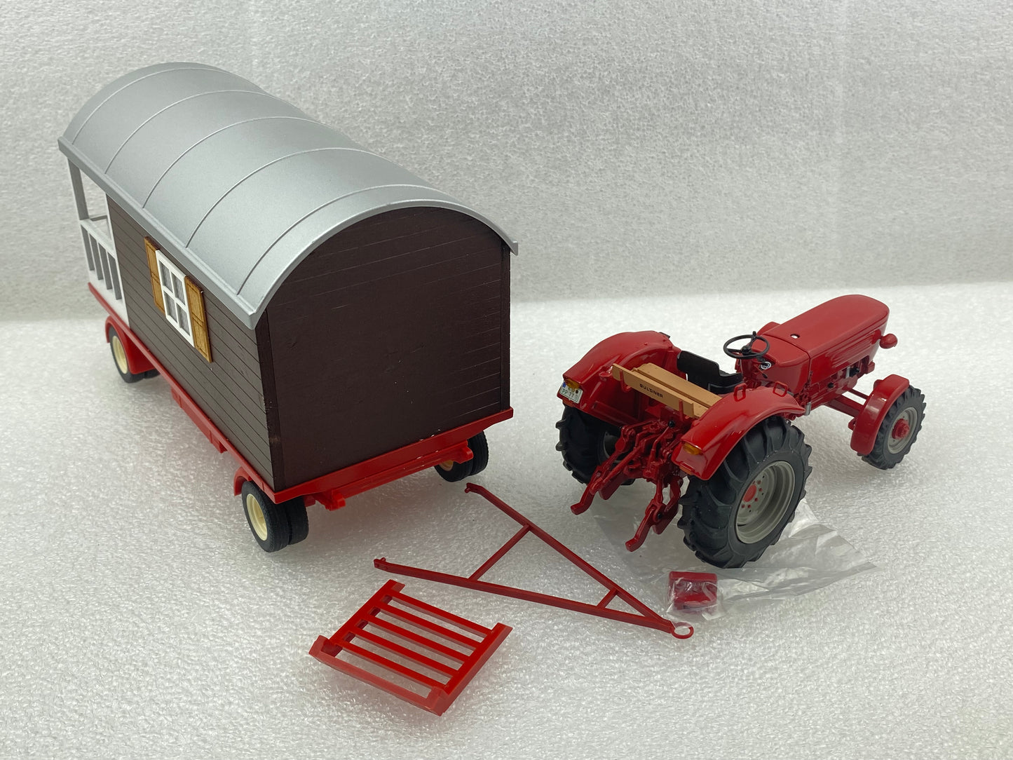 Schuco 1:32 Gueldner G75 A with trailer and balcony 450778500 (Damaged / Clearance Final Sale)