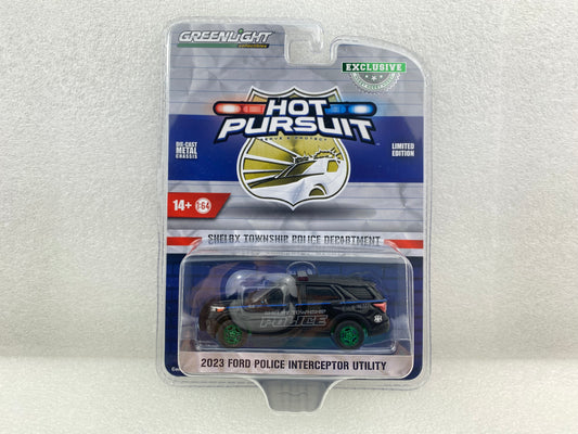 GreenLight Green Machine 1:64 Hot Pursuit - 2023 Ford Police Interceptor Utility - Shelby Township, Michigan 30451