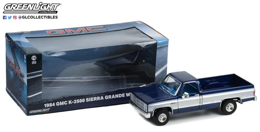 GreenLight 1:18 1984 GMC K-2500 Sierra Grande Wideside - Dark Blue Metallic and Silver 13659