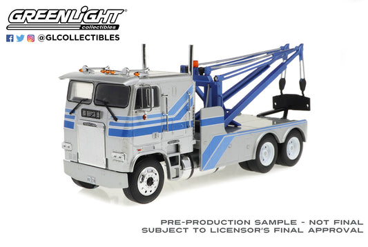 GreenLight 1:43 1984 Freightliner FLA 9664 Tow Truck - Silver with Blue Stripes 86632