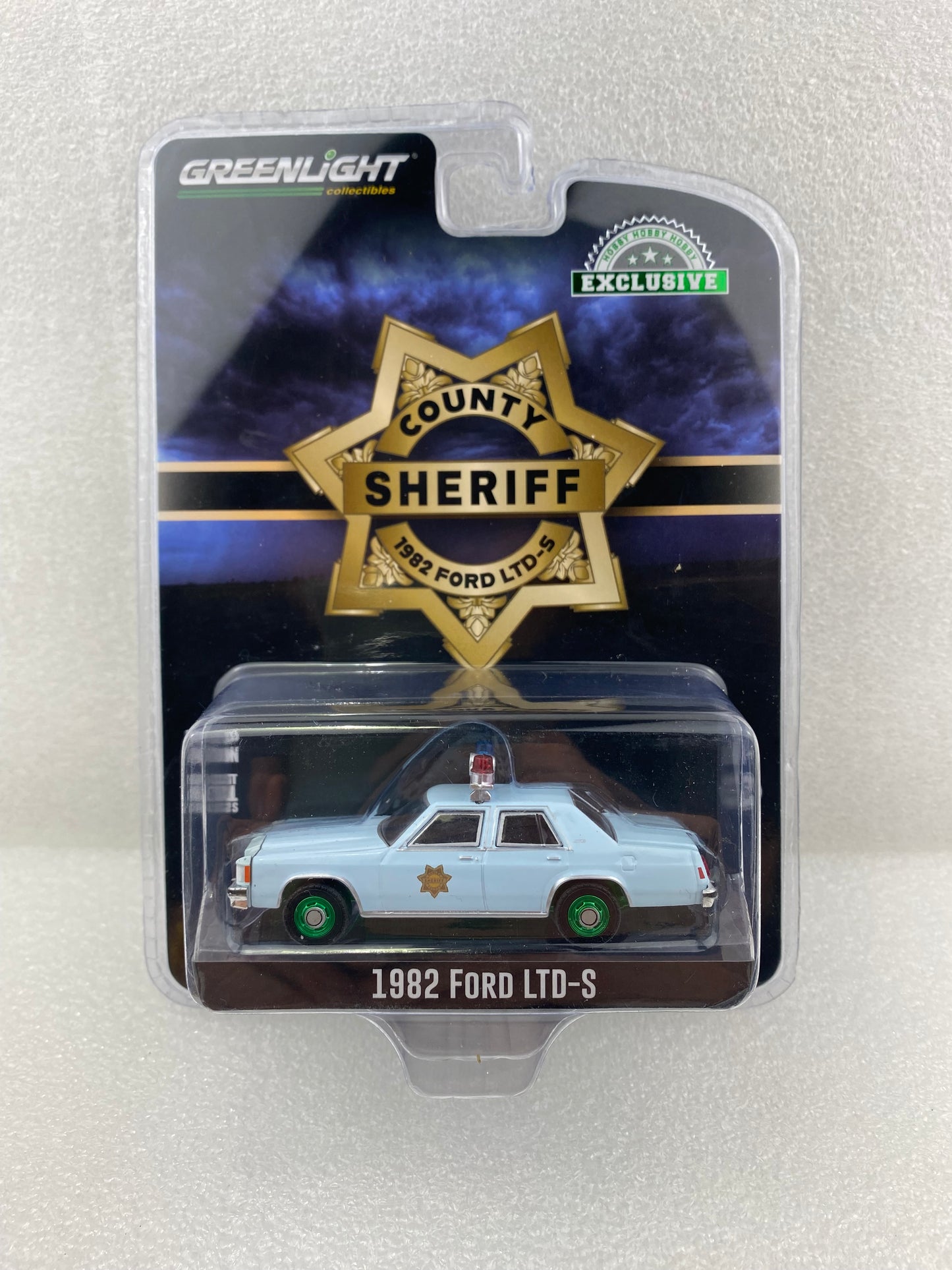GreenLight Green Machine 1:64 1982 Ford LTD-S - County Sheriff 30304