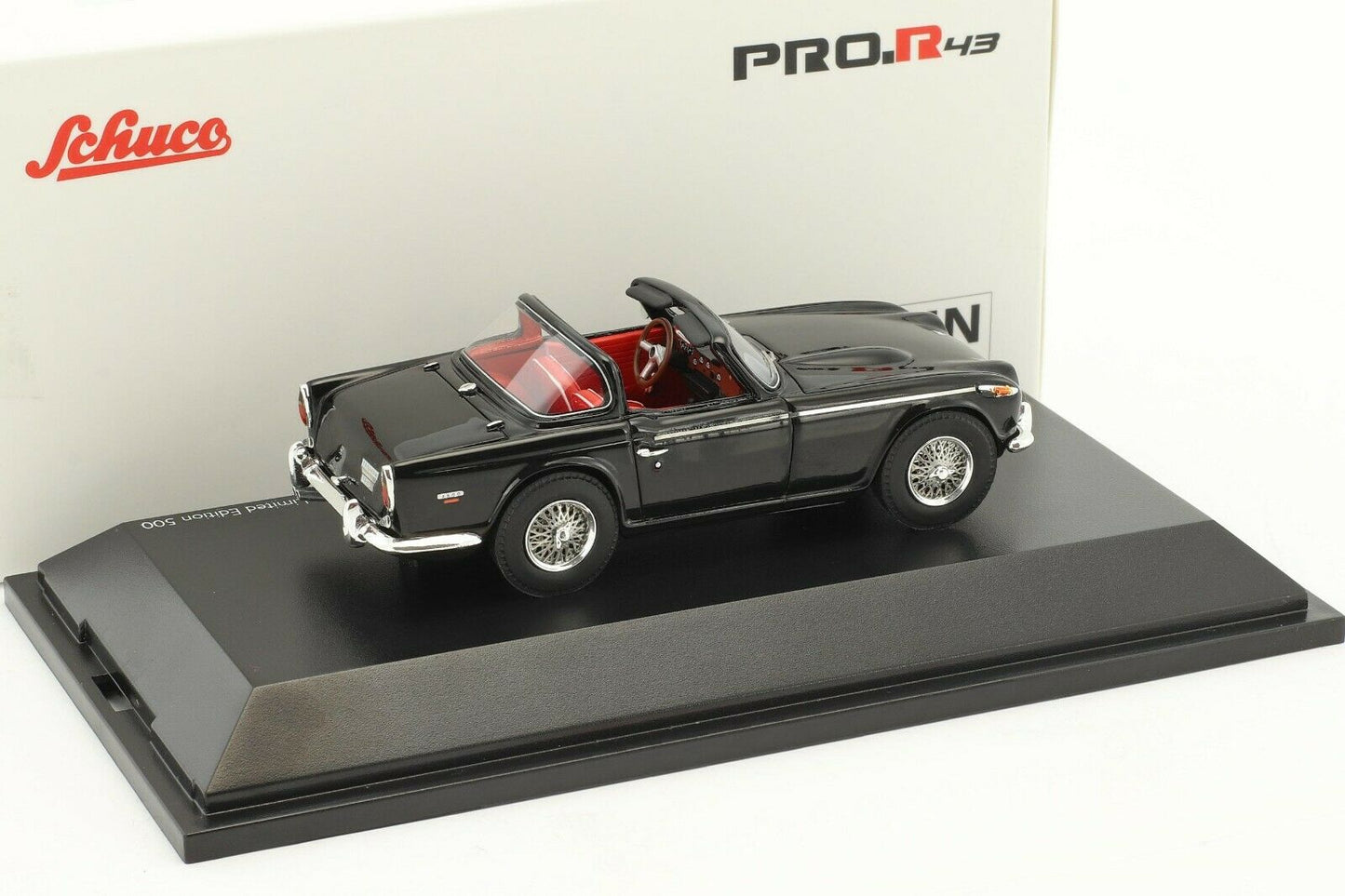 Schuco 1:43 Triumph TR5 with open surrey top Black 450887400