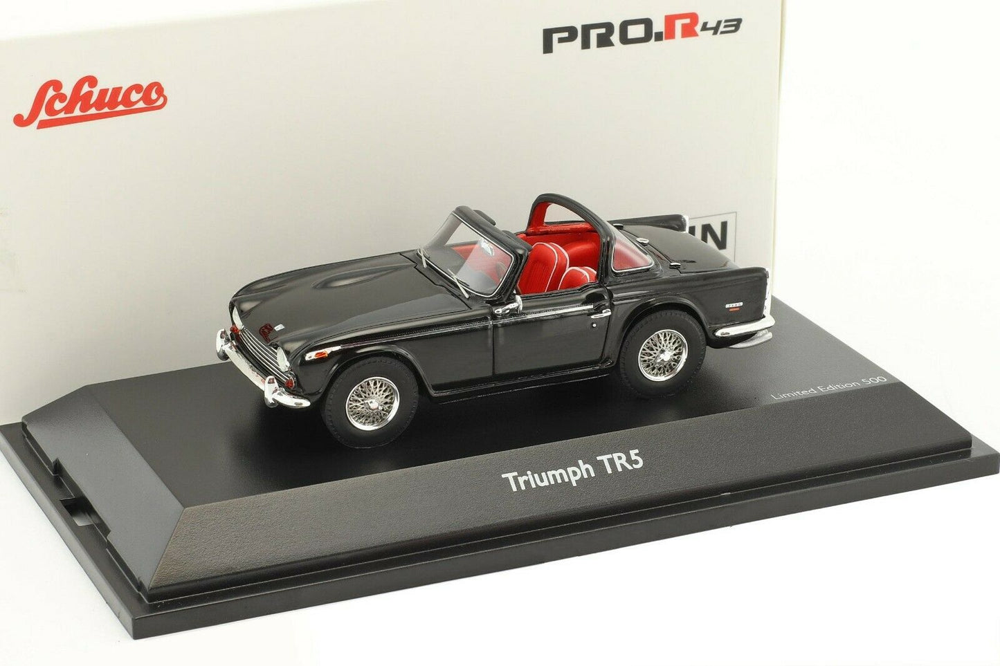 Schuco 1:43 Triumph TR5 with open surrey top Black 450887400
